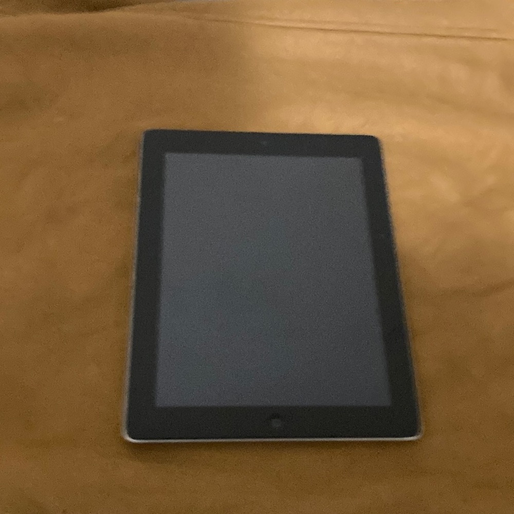 It works fully functional,ipad come with a charger,  good shape by no cracks etc